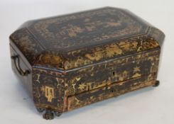 A MID 19TH CENTURY ORIENTAL BLACK LACQUERED SEWING BOX with gilt pictorial decoration, canted