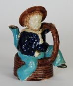 A NINETEENTH CENTURY MAJOLICA ISLE OF MAN SAILOR TEA POT, traditional form with leg spout, the base