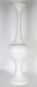 MODERN WHITE PAINTED LARGE FIBRE GLASS PEDESTAL VASE, with tall, waisted neck and circular base,