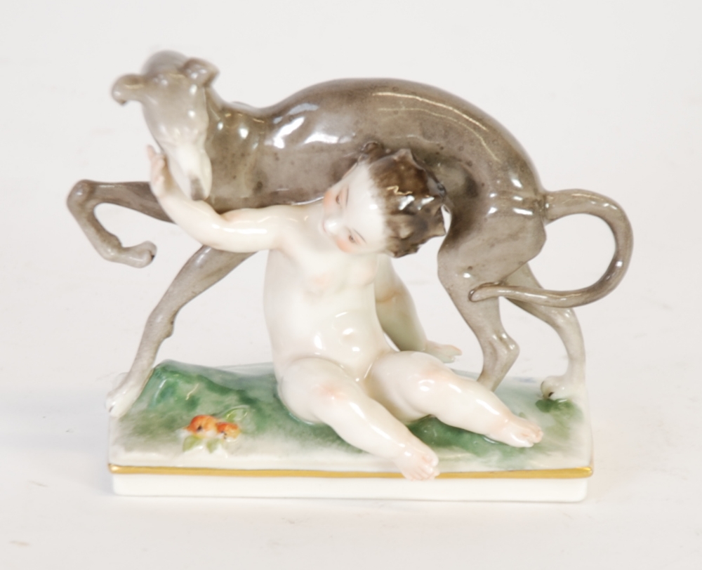 EARLY NINETEENTH CENTURY NAPLES, ITALIAN PORCELAIN GROUP, painted in colours and modelled as a dog