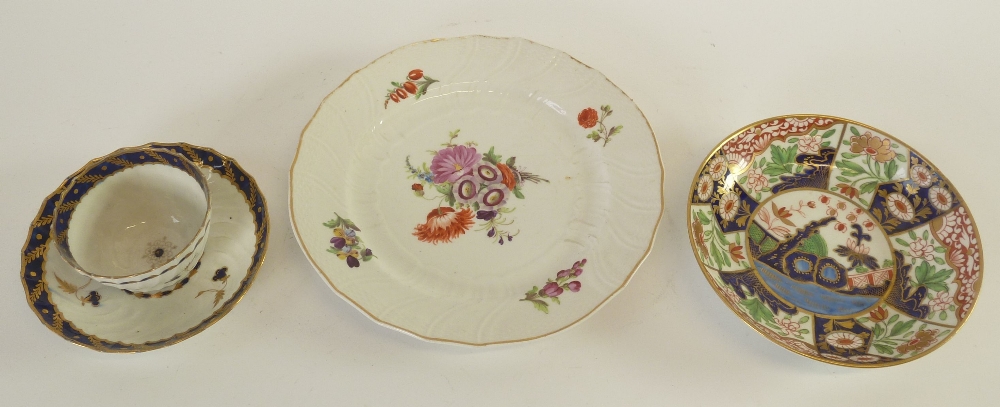 LATE EIGHTEENTH CENTURY WORCESTER WRYTHEN FLUTED PORCELAIN TEA BOWL AND SAUCER, decorated in blue