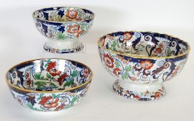 THREE 19th CENTURY `AMHERST JAPAN` PATTERN IRONSTONE POTTERY BOWLS comprising: a graduated pedestal