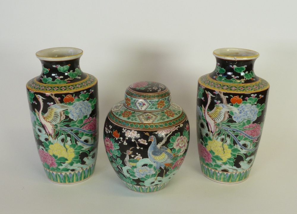 PAIR OF EARLY TWENTIETH CENTURY JAPANESE PORCELAIN FAMILLE NOIR DECORATED SHOULDERED OVIFORM VASES,