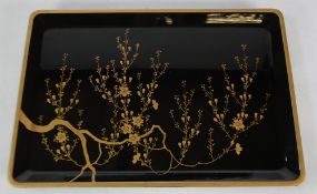 JAPANESE LATE MEIJI PERIOD BLACK AND GOLD LACQUER OBLONG TRAY, with raised gold edged border,