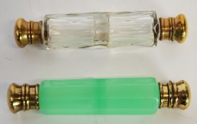 TWO NINETEENTH CENTURY DOUBLE ENDED FACET CUT GLASS PERFUME FLASKS,  one clear and one opaque