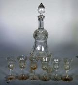 THISTLE SHAPED CUT GLASS SMALL DECANTER AND STOPPER, 8 1/2"" (21.6cm) high and a  MATCHING SET OF