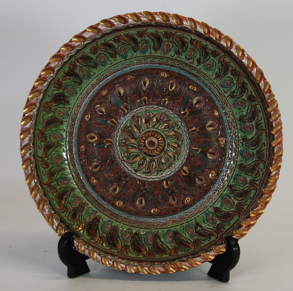 AN EARLY TWENTIETH CENTURY CONTINENTAL RED EARTHENWARE SHALLOW DISH, Sgraffito decorated in Moorish