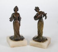 SMALL PAIR OF FRENCH ART NOUVEAU BRONZE FIGURES OF A MUSIC HALL SINGER AND DANCER, well cast with