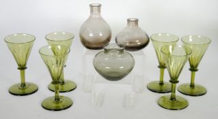 SET OF SIX GREEN STEMMED DRINKING GLASSES, each with conical bowl, octagonal knopped stem and