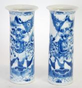 PAIR OF 20th CENTURY CHINESE BLUE AND WHITE PORCELAIN SLEEVE VASES with flared rims, painted with