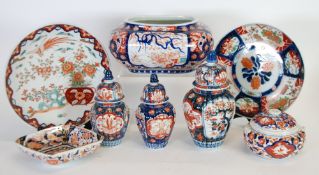 EIGHT PIECES OF JAPANESE IMARI PORCELAIN, comprising; GARNITURE OF THREE VASES, with covers, 9 1/