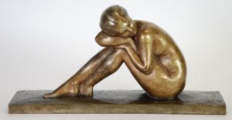 A. GENNARELLI, ART DECO PATINATED BRONZE NAKED FEMALE FIGURE, modelled seated on an oblong base, 9