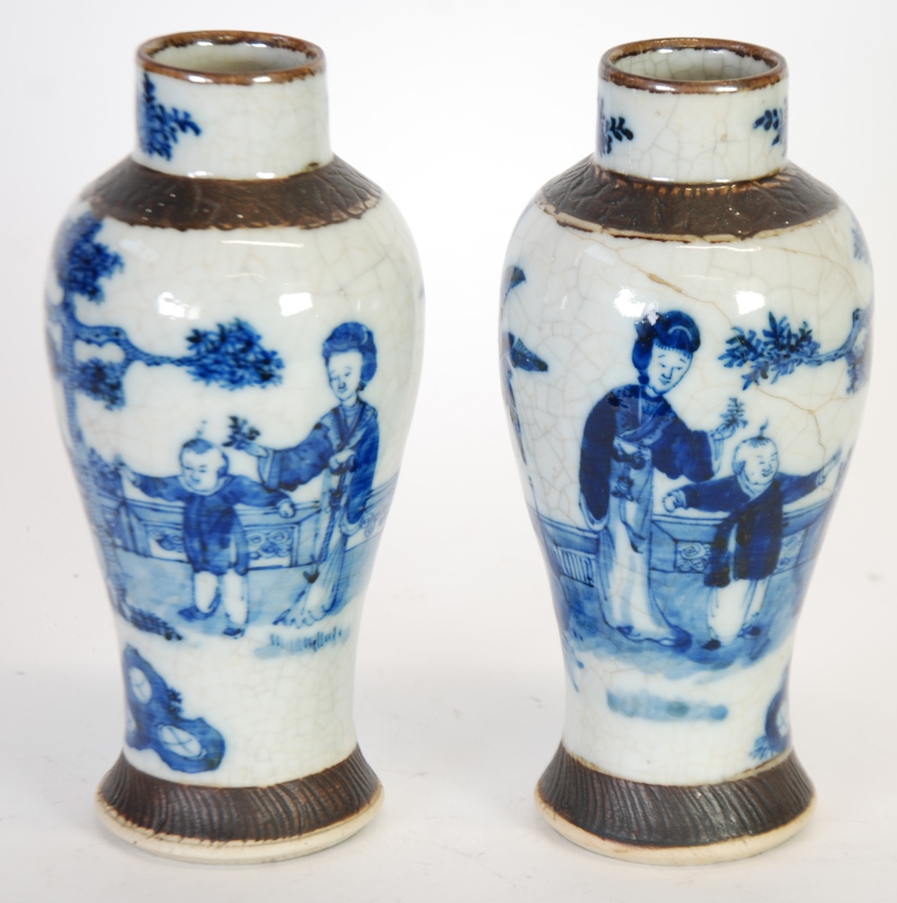 PAIR OF CHINESE BLUE AND WHITE CRACKLE GLAZED PORCELAIN VASES, of ovoid form with short,