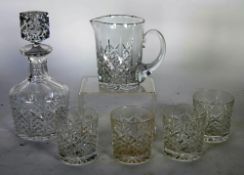 EDINBURGH CUT GLASS SPIRIT DECANTER AND STOPPER, matching WATER JUG AND A SET OF FOUR TUMBLERS,