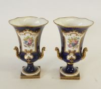 *PAIR OF EARLY 20TH CENTURY ROYAL CROWN DERBY HAND PAINTED CHINA, TWO HANDLED SMALL PEDESTAL VASES,