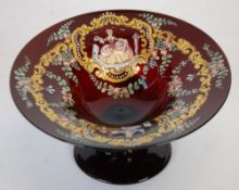 VENETIAN RUBY GLASS AND ENAMELLED TAZZA, the bowl decorated in colours  and gilt with figural