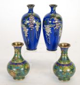 PAIR OF JAPANESE MEIJI PERIOD CLOISONNE VASES, of slender ovoid form with short waisted necks,