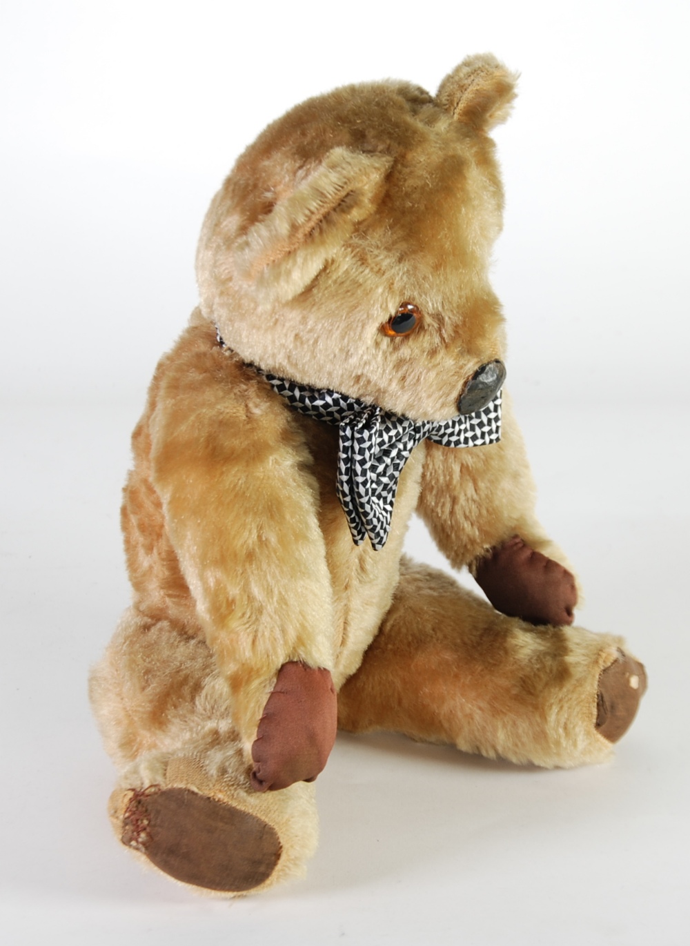 PALE GOLDEN MOHAIR PLUSH TEDDY BEAR,  with amber glass eyes, circular rexine nose, growler, brown