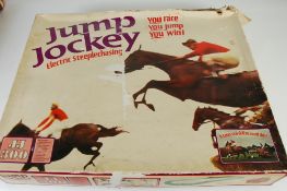 JUMP JOCKEY ELECTRIC RACE GAME (similar to Scalextrix track, but with horses mounted on 4 wheel