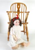 AN EARLY TWENTIETH CENTURY GERMAN SIMON AND HALBIG BISQUE HEAD DOLL, numbered 1248, having sleeping