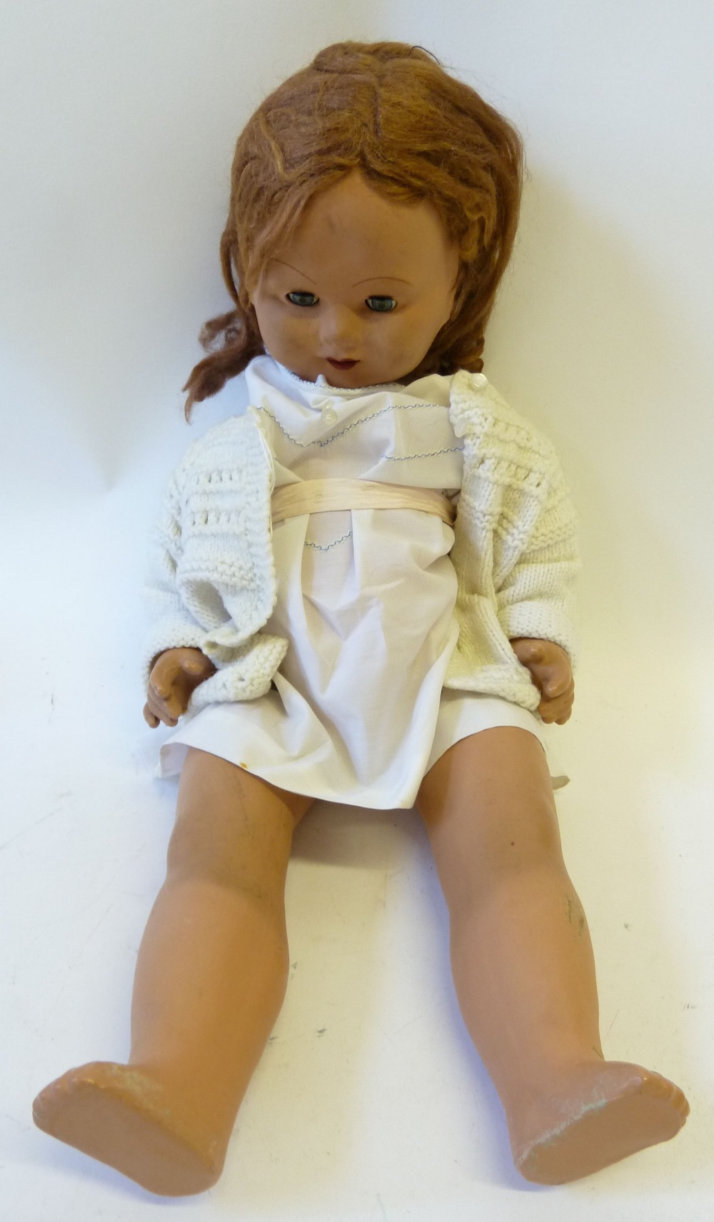 TWENTIETH CENTURY GIRL DOLL, with composition head, having sleeping blue eyes, open mouth, brown