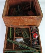MECCANO - LARGE QUANTITY OF 1930`s GREEN AND RED MECCANO PARTS in homemade wooden box with inner