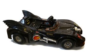 TOYS - ITALY CIRCA 1992 BATMAN FOREVER BATMOBILE ELECTRIC SIT AND RIDE CHILD`S CAR, circa 1992