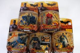 FIVE MATTEL `BATMAN BEGINS` MINT AND BOXED FIGURES on card under bubble pack viz `Battle Gear