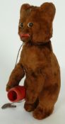 POSSIBLY GERMAN EARLY 20th CENTURY SPRING DRIVEN BEAR AUTOMATON in copper brown coloured velvet