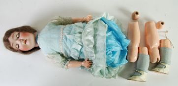 EARLY TWENTIETH CENTURY SIMON AND HALBIG BISQUE SWIVEL HEAD DOLL, having sleeping blue eyes and