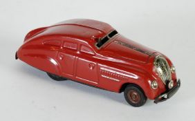 A 1930`s GERMAN SCHUCO CLOCKWORK TINPLATE MAROON BODY AUTOMOBILE with stop/fast lever (minus one