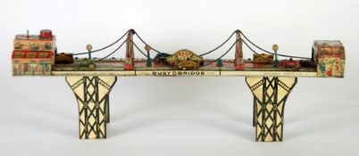 LOUIS MARX AND CO., NEW YORK USA. PRE WAR LITHOGRAPHED TINPLATE `BUSY BRIDGE` with spring driven