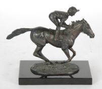 DAVID CORNELL, A MODERN LIMITED EDITION DARK BROWN PATINATED BRONZE of a race horse with jockey up,