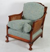 MAHOGANY FRAMED DOUBLE CANED BERGERE EASY ARMCHAIR, the arched top rail above downswept arms and