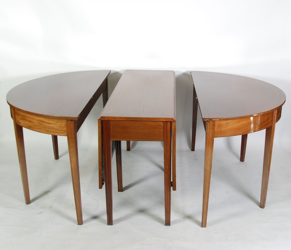 EARLY NINETEENTH CENTURY LINE INLAID MAHOGANY THREE PART DINING TABLE, comprising; PAIR OF `D` ENDS