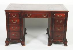 EARLY 20th CENTURY GEORGE II STYLE MAHOGANY TWIN PEDESTAL DESK, the moulded oblong top with three