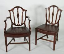 SET OF EIGHT EARLY TWENTIETH CENTURY HEPPLEWHITE STYLE CARVED MAHOGANY DINING CHAIRS (6 + 2), each