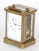 A TWENTIETH CENTURY ENGLISH LARGE CARRIAGE CLOCK, by Matthew Norman, London, striking on a gong, in