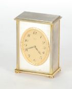 IMHOF MANTEL CLOCK, with Swiss 15 jewel eight day movement, in gilt brass case with silvered front