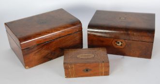 TWO SIMILAR VICTORIAN FIGURED WALNUTWOOD WORK BOXES, one with inlaid cartouche and escutcheons, the