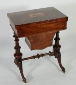 A MID VICTORIAN WALNUT SEWING/GAMES TABLE, the fold over swivelling top opening to reveal