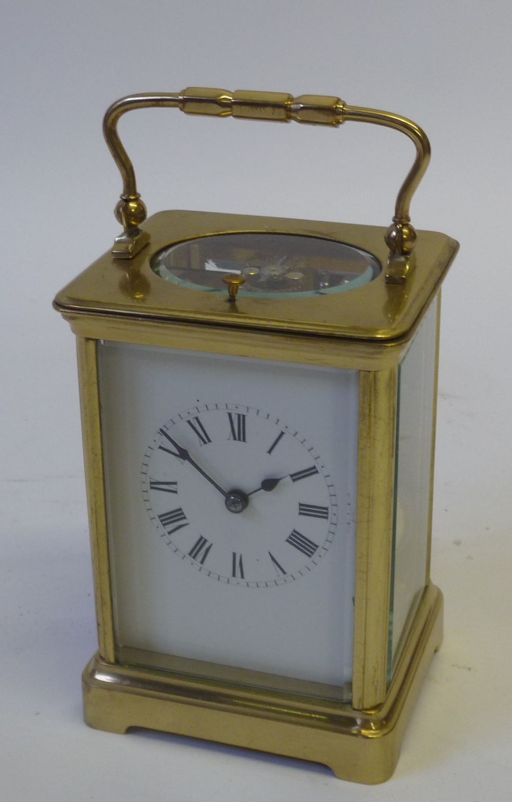 EARLY TWENTIETH CENTURY FRENCH BRASS CORNICHE CASED REPEATER CARRIAGE CLOCK, striking on a coiled