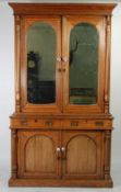 LATE 19th CENTURY, POSSIBLY ANGLO-INDIAN LIGHT OAK AND MAHOGANY LIBRARY BOOKCASE, the moulded