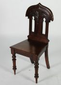 NINETEENTH CENTURY CARVED MAHOGANY HALL CHAIR, the back with two Moorish arched apertures, capped