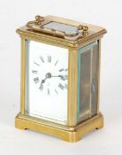 EARLY TWENTIETH CENTURY FRENCH BRASS CASED CARRIAGE CLOCK, typical form with white enamelled roman
