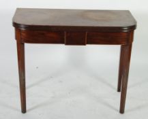 EARLY NINETEENTH LINE INLAID MAHOGANY FOLD OVER TEA TABLE, the rounded oblong top with moulded edge