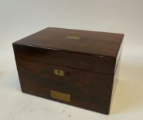 AN EARLY NINETEENTH CENTURY ROSEWOOD FITTED TOILET CASE, with brass cartouche and escutcheon, the