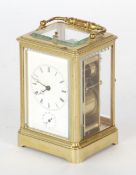 EARLY TWENTIETH CENTURY GILT BRASS REPEATING AND ALARM CARRIAGE CLOCK, signed Dent, A Paris, the