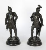 PAIR OF SPELTER FIGURES of Knights, both modelled standing, one with long sword and shield, the
