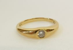 AN 18CT GOLD SOLITAIR DIAMOND RING, gypsy set with a brilliant cut diamond, 0.15ct approx., 4.8g